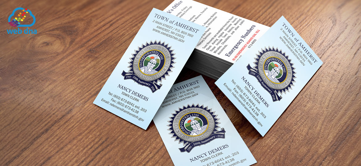 Business card designed for Town of Amherst New Hampshire stacked on table