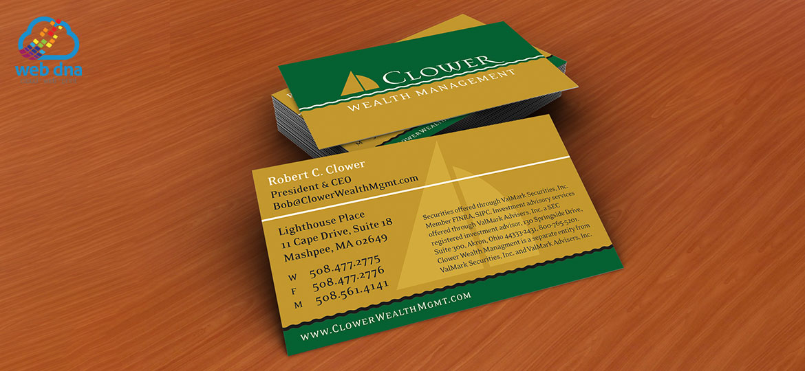 Business cards designed by Web DNA for Clower Wealth Management displayed on conference room table. 